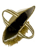 Close-up of a decorative brush with a handle on a light background