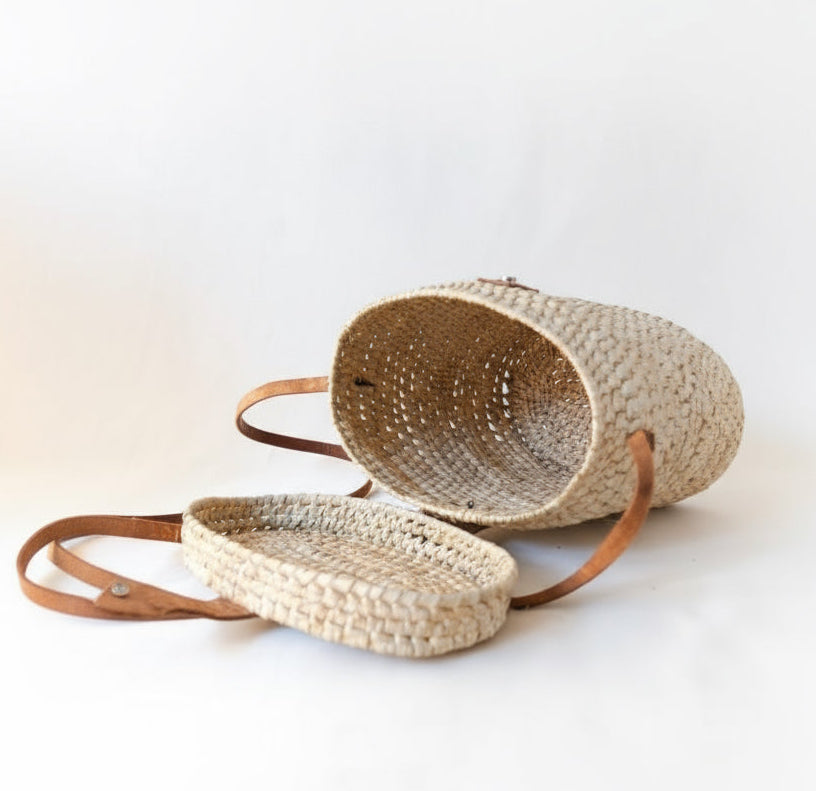 Product image of a woven rectangular bag with , showing the inside 